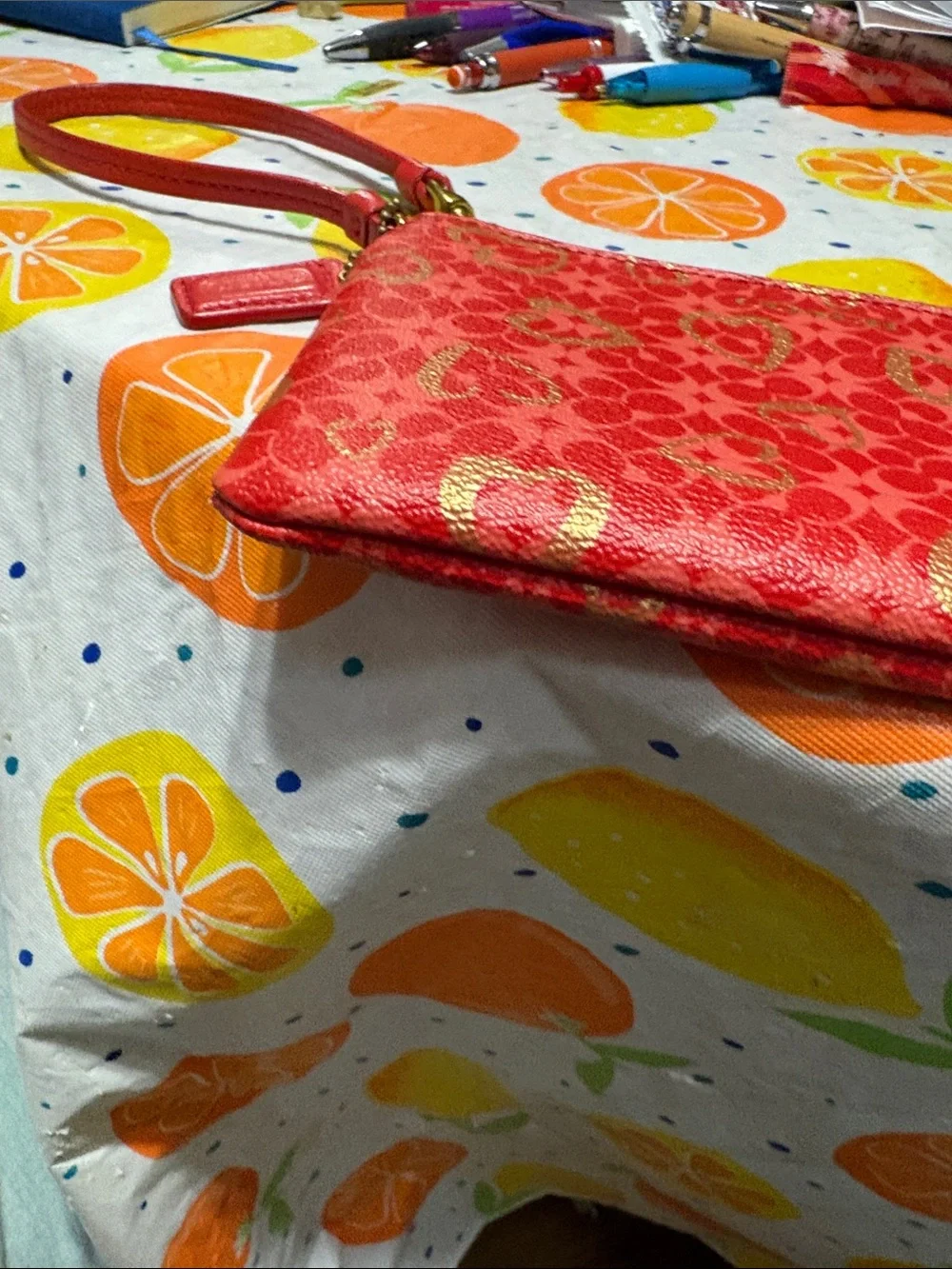 Coach Red Wristlet with Gold Heart Print